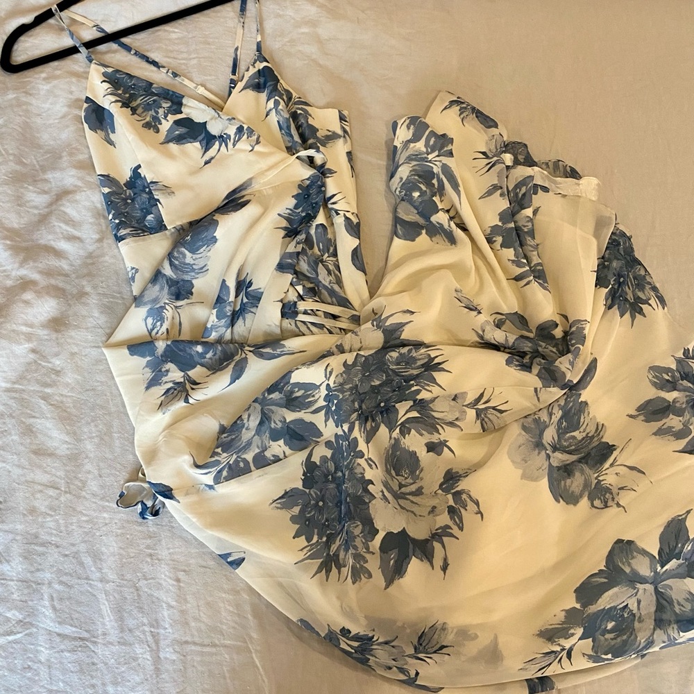 Lulu’s Elegantly Inclined Cream and Blue Floral Print Wrap Maxi Dress
